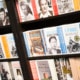 A series of books on a shelf.